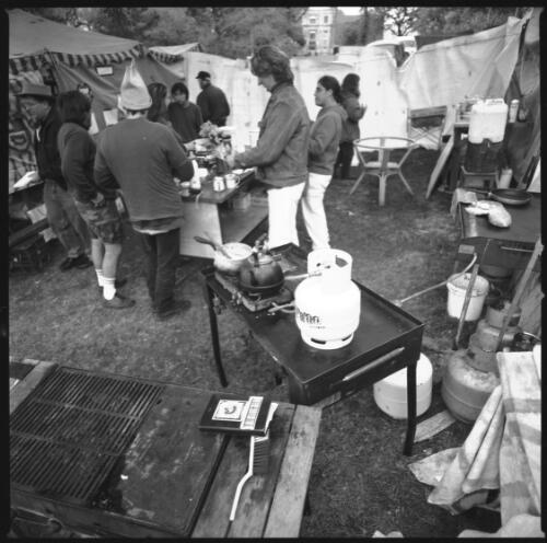 Cups of tea and coffee being made in the outdoors kitchen, Aboriginal Tent Embassy, Victoria Park, University of Sydney, 19 August 2000 [picture] / Loui Seselja