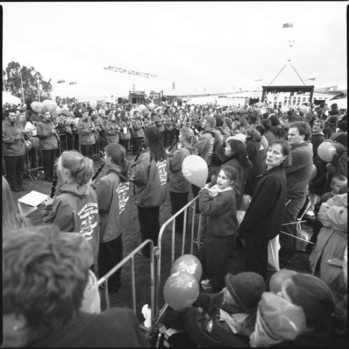 Marching band members form a guard of honour, awaiting the arrival of the torch bearer, Olympic torch relay, New Parliament House, Canberra, 5 September 2000 [2] [picture] / Loui Seselja