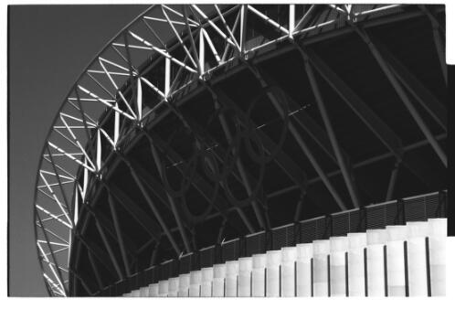 Olympic rings on the front of the Olympic Stadium, Olympic Park, Homebush, 20 September 2000 [picture] / Loui Seselja