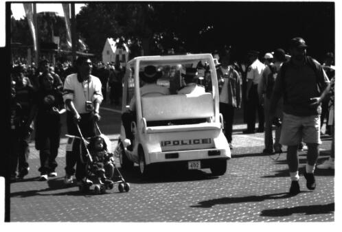 An electric police cart on Olympic Boulevard, Olympic Park, Homebush, 20 September 2000 [picture] / Loui Seselja