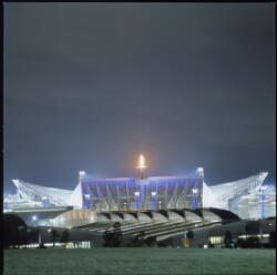 Night time shot of Sydney Olympic Park featuring Stadium Australia and ...