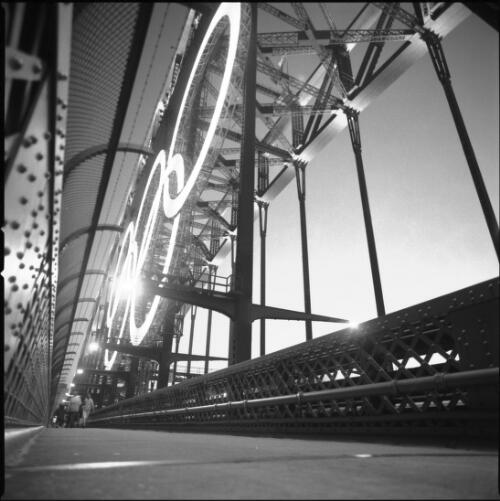 Illuminated Olympic rings on the Sydney Harbour Bridge, 21 September 2000 [1] [picture] / Loui Seselja