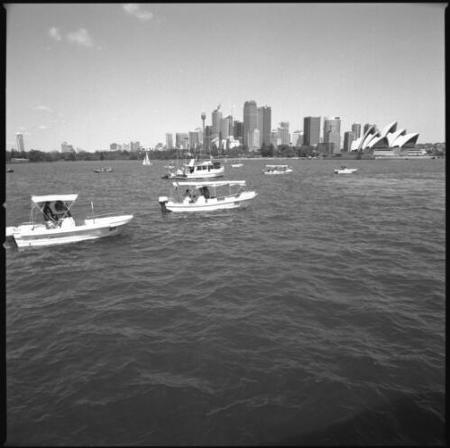 Sydney Harbour with the CBD skyline and the Sydney Opera House, 24 September 2000 [picture] / Loui Seselja