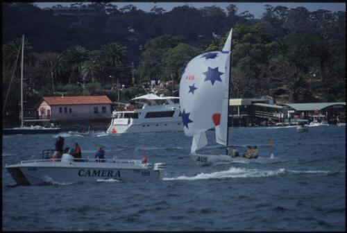 The Australian boat and the camera boat on Sydney Harbour, sailing, soling class, Sydney 2000 Olympic Games, 24 September 2000 [picture] / Loui Seselja