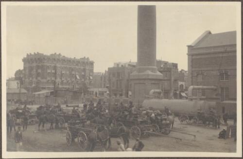 [Horse-drawn] transports waiting for B. Squadron, [of the 8th Light Horse Regiment following arrival at Cairo's central railstation, April 4, 1915] [picture] / J.P. Campbell