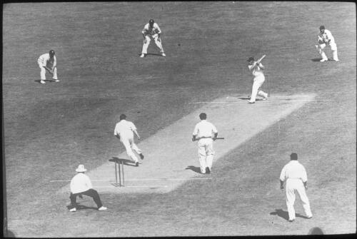 Don Bradman playing stroke off the bowling of Ken Farnes, 1936/37 Marylebone Cricket Club (MCC) tour of Australia [transparency]