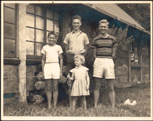 Arthur Groom's four children outside the manager's cottage, Binna Burra, Queensland, ca. 1953 [picture] / Arthur Groom