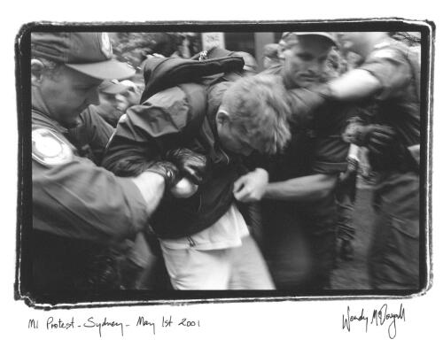 M1 protest in Sydney, May 1st 2001, [a protester is getting arrested] [picture] / Wendy McDougall