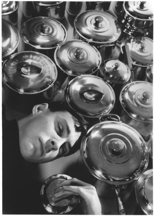 Max Dupain, self portrait, with saucepans, Bond Street Studio, [Sydney], early 1930s [picture] / Max Dupain