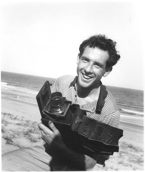 Portrait of Damien Parer on Bungan Beach, N.S.W., c 1930s [picture] / [Max Dupain]