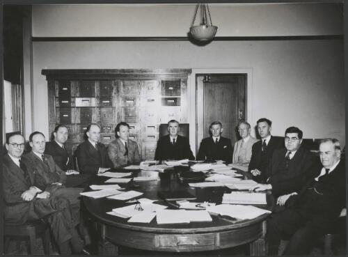 [Sir Kenneth Bailey (2nd left) at a meeting] [picture] / Australian official photograph, Dept. of Information