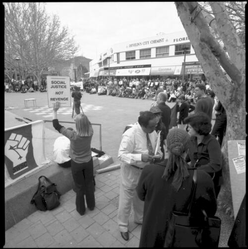 [Photograph of many of the demonstrators assembled on three sides of the speakers' podium at the Rally for Peace held in Garema Place, Canberra, A.C.T., Sept. 20, 2001] [picture] / Loui Seselja