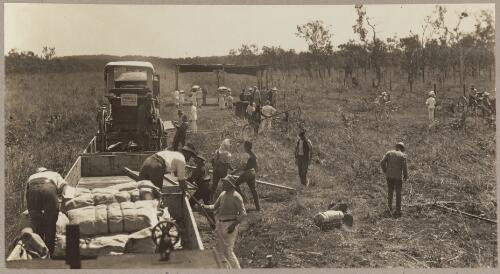A start was made at Rum Jungle to visit the Government Demonstration Farm, conveyances being unloaded from the train, Northern Territory, 1912 [picture] / J.P. Campbell