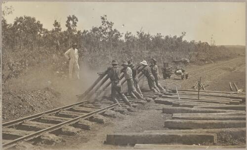 Unloading farm goods and putting in new siding for the farm, the first break in the line for 16 years, 2 [picture] / J.P. Campbell