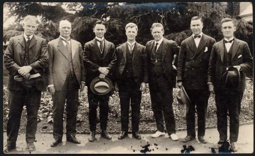 [Group portrait of James Fenton, Edward Riley, Francis Forde, James Scullin, Frank Brennan, Parker Moloney and Norman Makin, Canberra, 1920s, 1] [picture] / [Frank H. Boland]