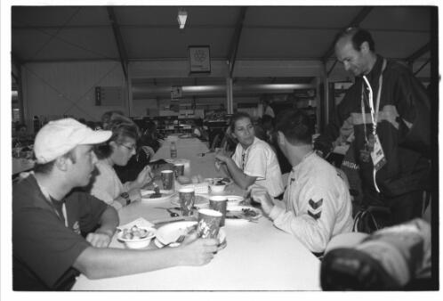 Members of the Greek team in the dining hall in the Paralympic Village, Sydney 2000 Paralympic Games, 16 October 2000 [picture] / Jim Nomarhas