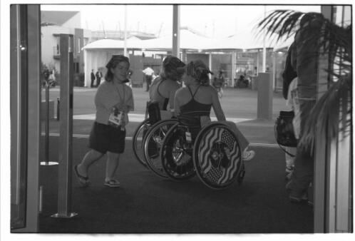 Members of the American team at the entrance to the dining hall in the Paralympic Village, Sydney 2000 Paralympic Games, 16 October 2000 [picture] / Jim Nomarhas