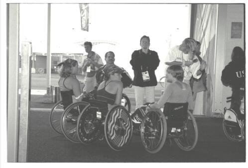 Members of the American team at the entrance to the dining hall in the Paralympic Village, Sydney 2000 Paralympic Games, 16 October 2000 [picture] / Jim Nomarhas