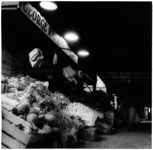 Fruit stall at the Queen Victoria Markets, Melbourne, 1956 [picture] / Jeff Carter