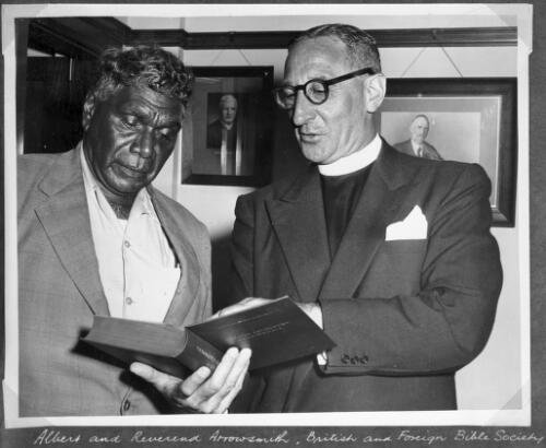 Albert Namatjira and Rev. Arrowsmith of the British and Foreign Bible Society looking at a book [picture]