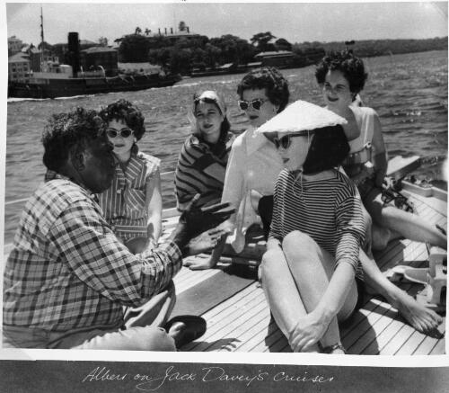 Albert Namatjira on Jack Davey's cruiser talking to a group of women [picture]