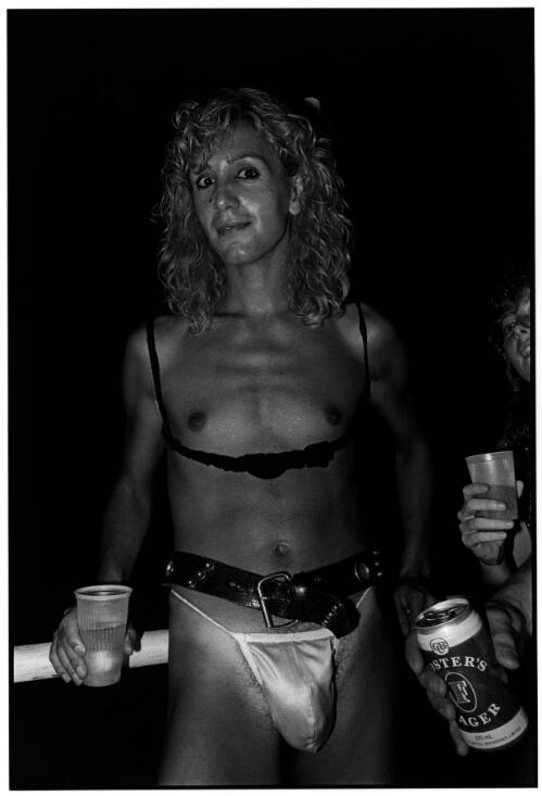 Permanent wave man holding plastic cup : Mardi Gras cabaret at Horden Pavilion, Driver Avenue, Paddington, February 21, 1987 [picture] / Satoshi Kinoshita