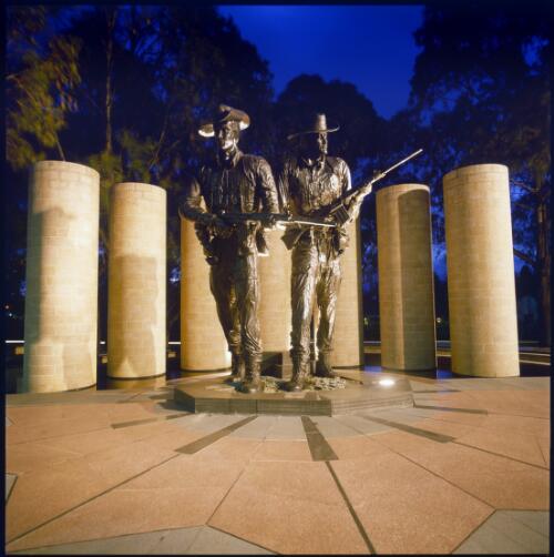 Australian Army National Memorial, pictured at night, Anzac Parade, Canberra, 2002, [1] [transparency] / Damian McDonald