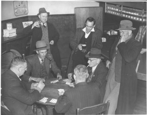 Playing euchre in the Drouin Hotel, Victoria [picture] / [photo by Jim Fitzpatrick]