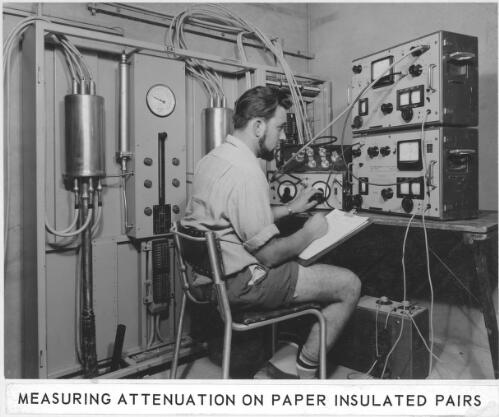 Measuring attenuation on paper insulated pairs [within an unattended repeater station during installation of coaxial cable between Sydney and Melbourne, 1961] [picture]