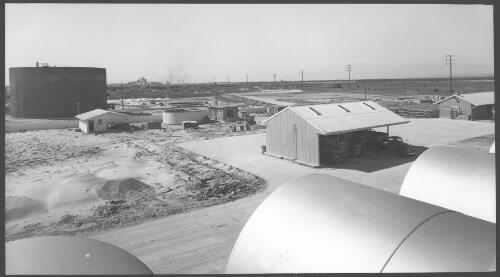 View of the later stage of construction of tank B.1 and surrounding buildings, seaboard terminal, Birkenhead, South Australia [picture]