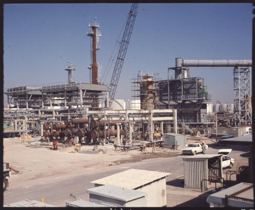 View of the Kurnell Oil Refinery showing refining plants and partial view of a crane, New South Wales [2] [transparency]