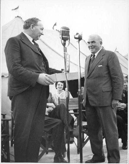 Sir James Bisset, right, presenting a barometer to Thomas Playford, premier of South Australia,  during the opening of the Birkenhead terminal, 29 September, 1950 [picture]