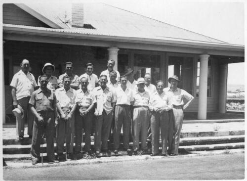 Portrait of the competitors taking part in the "OK" Callaghan Golf Cup in front of the clubhouse at the Glenelg Golf Course, South Australia, December, 1951 [picture]