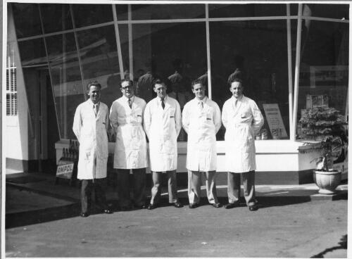 Portrait of the participants in the first course on marketing development held at the Mosman service station,  New South Wales, left to right, A. Wark, P. Quin, E. De Soty, W. Ritchie and A. Hollings, January, 1953 [picture]