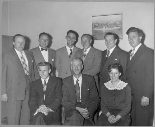 Portrait of the Kadina district office staff at its opening, left to right, J. Geoghegan, A. Hollings, R. Nitschke, P. Budden, J Geraghty, W. Phillips, G. Bown, J. Falahey and Miss L. Phillips, South Australia, September, 1956 [picture]
