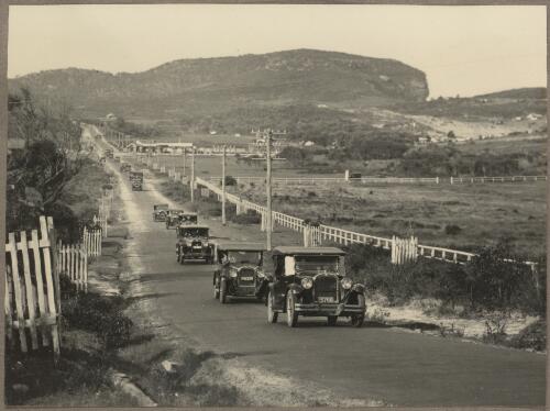 [Motor cars driving along road, Avalon, New South Wales, 1930] [picture]