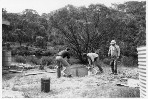 Arthur Tange, Christopher Tange and Angus Moir installing a septic tank, Yaouk Valley, New South Wales, December 1975 (4) [picture]