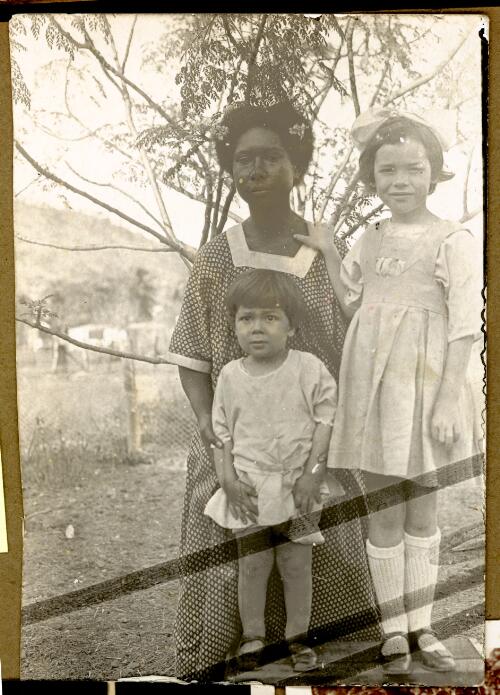 [Joan and Neville Stanley with unidentified female domestic worker, Port Moresby, New Guinea, ca. 1920] [picture]