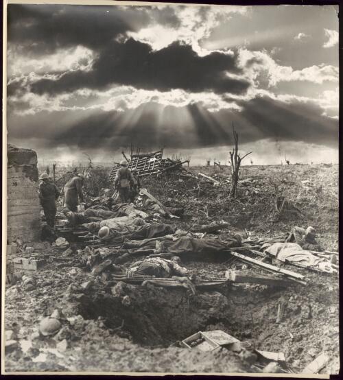 The morning after the first battle of Passchendaele [Passendale] showing Australian Infantry wounded around a blockhouse near the site of Zonnebeke Railway Station, October 12, 1917 [picture] / Frank Hurley