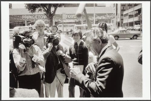 Bob Hawke checks his notes while awaiting Gough Whitlam's arrival, during the December 1977 campaign Melbourne, Victoria, 1977 [picture] / Andrew Chapman