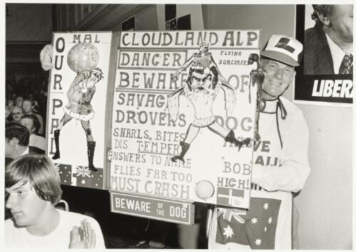 Liberal supporter with his placard at the Liberal campaign launch Malvern Town Hall, Melbourne, Victoria, 1983 [picture] / Andrew Chapman