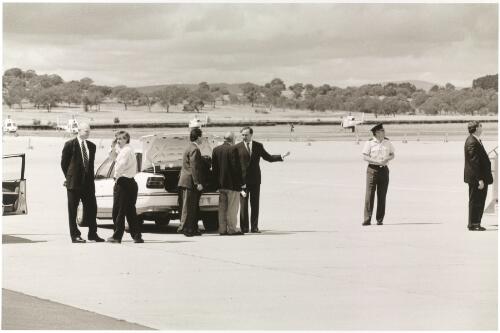 Prime Minister Paul Keating arrives in Canberra during the 1996 Federal election campaign.  Accompanying him are advisor Don Russell (far left) and speechwriter Don Watson (second from left) [picture] / Andrew Chapman