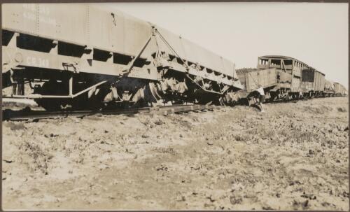 Derailment of trucks at 761 mile, [South Australia],1939 [picture] / Clarence Bernhardt