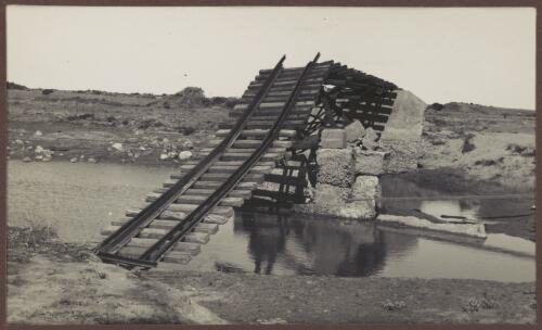 Damaged railway bridge at Strangways Springs, South Australia, 1938, 3 [picture] / Clarence Bernhardt