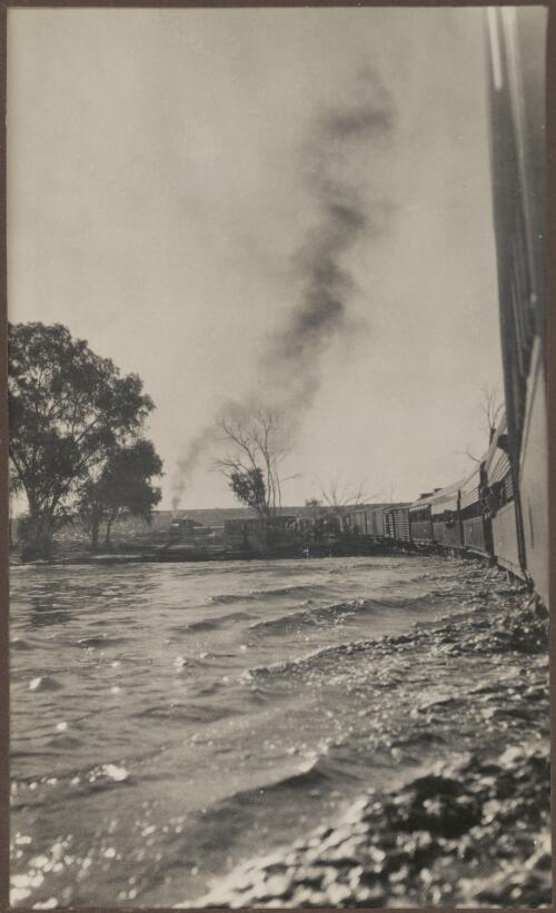 Train crossing flooded Finke River, Northern Territory, 1939, 2 [picture] / Clarence Bernhardt