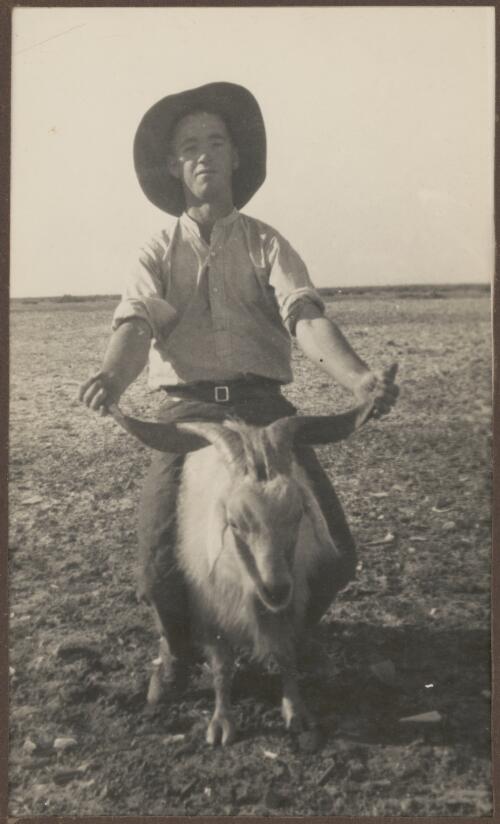 Portrait of Clarence Bernhardt holding a goat, Coward Springs, South Australia, 1936 [picture]