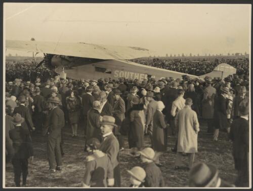 Crowd surrounding the Southern Cross, Fokker monoplane F.VII/3m, VH-USU, Canberra, June 1928 [picture] / Sydney Mail