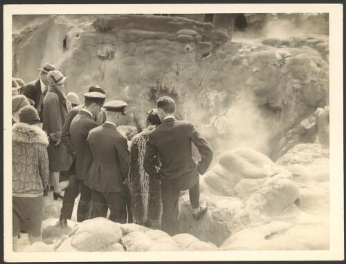 Crew of the Southern Cross, observe a geyser at Rotorua, New Zealand, September 1928 [picture] / Weekly News