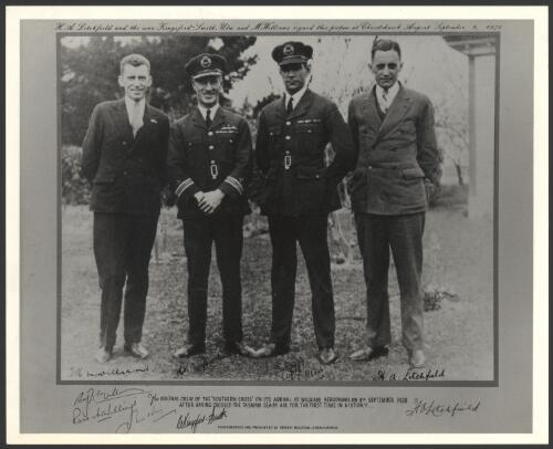 Portrait of T.H. McWilliam, Charles Kingsford Smith, Charles Ulm and H.A. Litchfield at Wigram Aerodrome, Christchurch, New Zealand, 11 September 1928 [picture] / Ernest Boulton