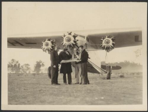 Faith in Australia VH UXX. Loading test flights at Richmond, New South Wales, 1933, P.G. Taylor, Charles Ulm, Scotty Allan and  R.N. Boulton [picture]